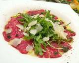 Beef Carpaccio with Arugula, pesto oil and truffle paste recipe step 9 photo