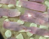 Foto del paso 6 de la receta: FAINÁ RELLENA DE JAMÓN Y QUESO 🍕🍖🧅🧀🍕 (en licuadora) 🍕🍖🧀🍕🧅🍕