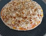 A picture of step 9 of Cheesy Mexican Veg Pizza.