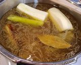 Foto del paso 3 de la receta: Caldo de pollo con cabello de ángel
