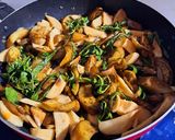 A picture of step 5 of Eggplant and King Oyster Mushrooms Stir-Fried with Basil.