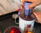 A picture of step 3 of Beet Carrot and Orange Detox Drink.