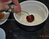A picture of step 1 of White Chocolate dipped Cherries.