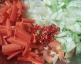 A picture of step 11 of Tomato rice with chicken and salad.