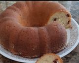 A picture of step 4 of Cranberry coconut donut cake.