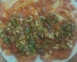 A picture of step 3 of Indian style cheese paneer veg pizza paratha.