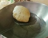 A picture of step 5 of Kheer Puri.