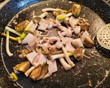 A picture of step 3 of Black Rice with Cuttlefish, Artichokes, Shrimp, and Green Garlic.