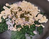 Foto del passaggio 3 della ricetta Calamari farciti con provola e pinoli