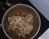 A picture of step 4 of Tomato Sausage Soup.