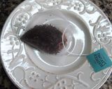Foto del paso 1 de la receta: Cerezas y arándanos con canela, té Earl Grey y ron