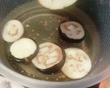 A picture of step 1 of Baingan k pakore.