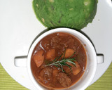 A picture of step 6 of Mokimo served with beef stew.