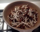 A picture of step 2 of Tagliatelle with Salamella Ragù, Pioppini Mushrooms, and Walnuts.