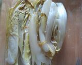 A picture of step 1 of 10 min veggie lunch: chicory with baked cheese and walnuts.