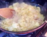 Foto del paso 3 de la receta: Tortilla de papas rellena con queso y jamón