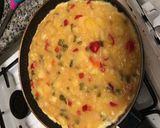 A picture of step 9 of Spanish Potato Omelette with Onion and Peppers.