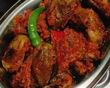 A picture of step 10 of Rajasthani Stuffed Eggplant.