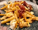 Foto del paso 6 de la receta Huevos rotos con trufa negra y jamón ibérico