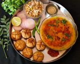 A picture of step 7 of Rajsthani Dal Baati Churma thali (lunch or dinner).