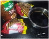 A picture of step 2 of Marie Biscuits Tiramisu.
