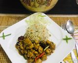 A picture of step 10 of Kung pao chicken with egg fried rice.