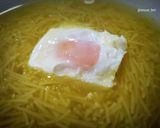 A picture of step 6 of Vegetable and Turmeric Soup with Noodles and Poached Egg.