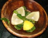 A picture of step 1 of Mojito lemon mint mocktail.