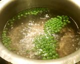 A picture of step 5 of Boiled white rice with green peas 🍚☺.
