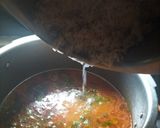 A picture of step 7 of Aloo chane ki tahiri.