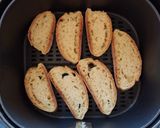 A picture of step 2 of Toasted Bread with Roasted Peppers and Anchovy Fillets.