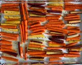 A picture of step 4 of Roasted Carrots with Thyme, Oregano, and Parsley.