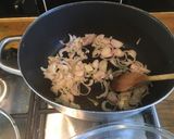 A picture of step 2 of Italian Tomato Stew with Kale and Cannelini beans.