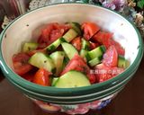 A picture of step 8 of Cucumber and Tomato Vinaigrette Salad.