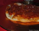 A picture of step 15 of ِDough fried pizza.
