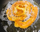 A picture of step 7 of Homemade Funnel Cakes.