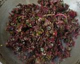 A picture of step 2 of Lal Saag Bhaja/Amaranth.