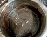 A picture of step 5 of Choco lava topped with Ganache.