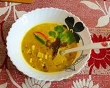 A picture of step 3 of Traditional Bengali Narkol Diye Bhaja Moong Dal.