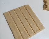 【副食品】022 ：牛奶/芝麻 磨牙棒（鬆餅粉應用）的食譜步驟4照片