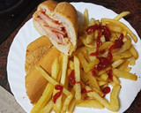 Foto del paso 4 de la receta: Bocadillo de lomo adobado con queso y cebolla frita con papas