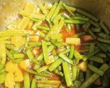 A picture of step 5 of Gawar potato sabji.