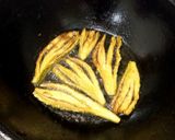 A picture of step 6 of Fry bitter grud (karaly) with peels.