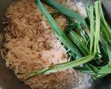 A picture of step 1 of Lemongrass rice.