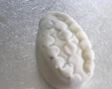 A picture of step 5 of Dates filled with almond fudge.