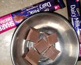 A picture of step 7 of Choco filled Biscuit Swiss Roll.