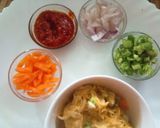 A picture of step 5 of Schezwan upma with veg bonda Manchurian.