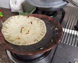 A picture of step 9 of Baingan bhartha and bajara roti.