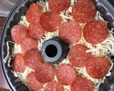 A picture of step 5 of Pizza monkey bread.