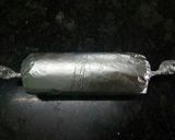 A picture of step 13 of #bandhan# khajur ke dry fruits roll.